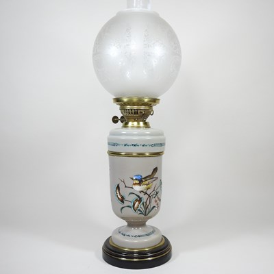 Lot 153 - An oil lamp and shade