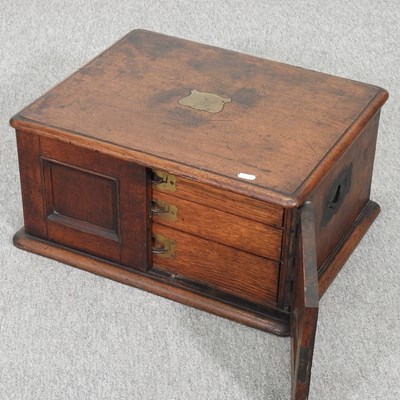 Lot 251 - An oak cutlery cabinet
