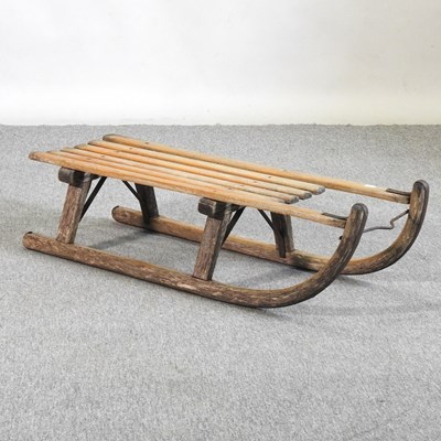 Lot 326 - A wooden sledge