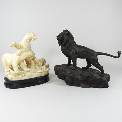 Lot 126 - A bronzed model of a lion