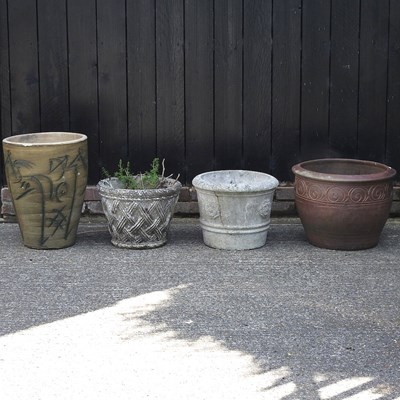 Lot 318 - A collection of four garden pots