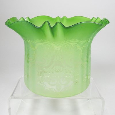 Lot 21 - A green glass oil lamp shade