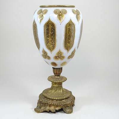 Lot 11 - An overlaid glass oil lamp base
