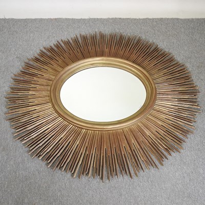 Lot 264 - A large sunburst wall mirror