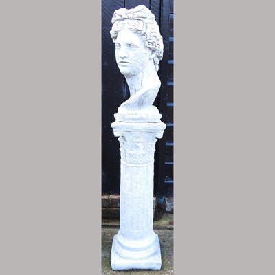 Lot 349 - A cast stone head, on a column