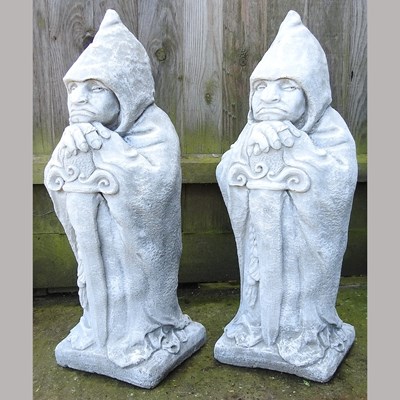 Lot 380 - A pair of garden statues