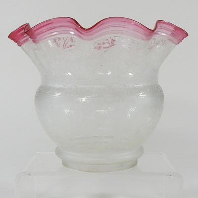 Lot 76 - A clear and pink oil lamp shade