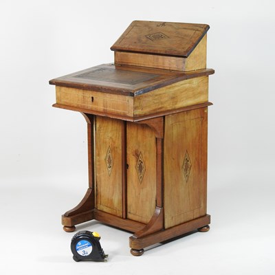Lot 9 - A Victorian walnut and inlaid miniature davenport