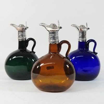 Lot 17 - A 19th century coloured glass claret jug