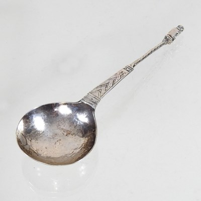 Lot 49 - A sejant silver spoon