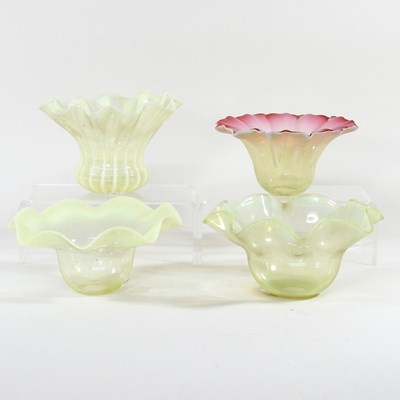 Lot 51 - A collection of four vaseline oil lamp shades