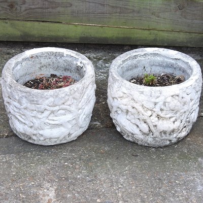 Lot 516 - A pair of cast stone planters
