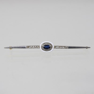 Lot 22 - An 18 carat gold and platinum set bar brooch