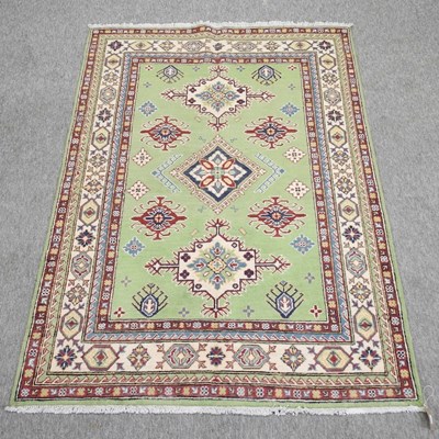 Lot 165 - An Afghan woollen rug
