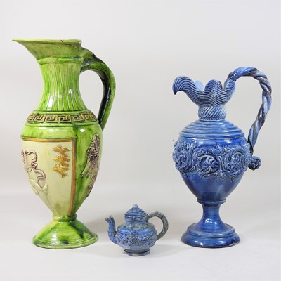 Lot 108 - A 19th century Castle Hedingham pottery green glazed ewer