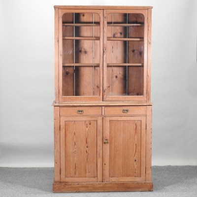 Lot 72 - An antique pine glazed cabinet
