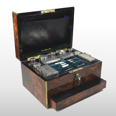 Lot 93 - A Victorian burr walnut and brass bound dressing case
