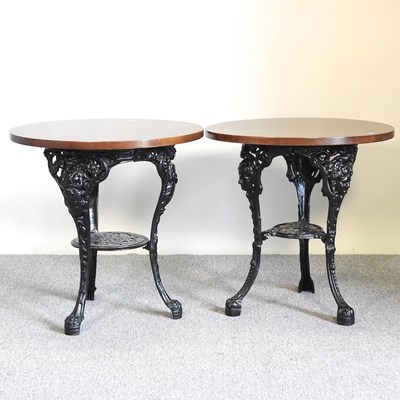 Lot 35 - A pair of cast iron pub tables