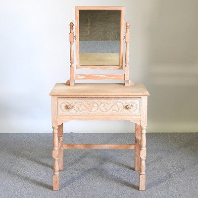 Lot 511 - A limed oak table