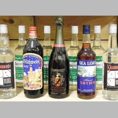 Lot 459 - A collection of bottles of spirits