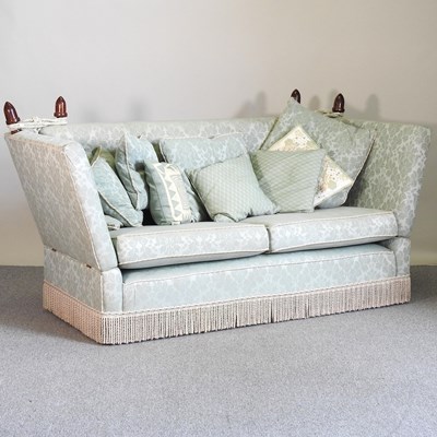 Lot 512 - A green upholstered knowle sofa