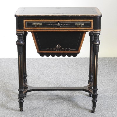 Lot 508 - A Victorian ebonised sewing table