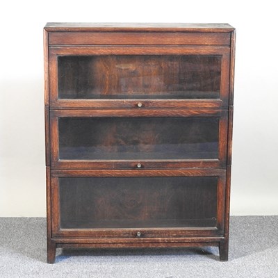 Lot 25 - A Globe Wernicke style sectional oak bookcase