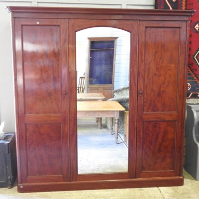 Lot 113 - A Victorian mahogany triple wardrobe