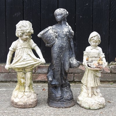 Lot 623 - A cast stone black painted garden figure of a...