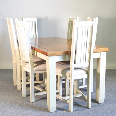 Lot 604 - A cream painted oak dining table, together...