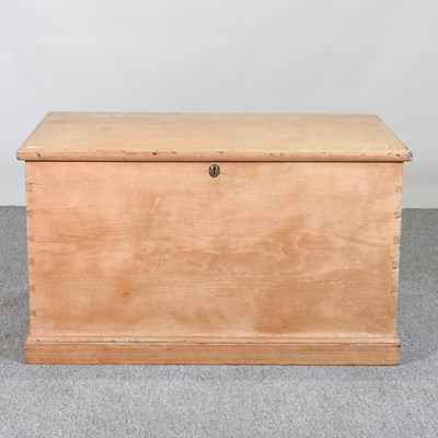 Lot 613 - An antique pine trunk, with a hinged lid
