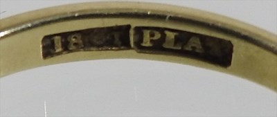 Lot 67 - An 18 carat gold and platinum set five stone...