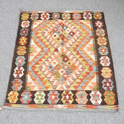 Lot 60 - A kilim, with a flowerhead border, 126 x 85cm