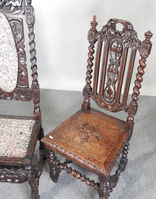 Lot 63 - A pair of 19th century carved oak high back...