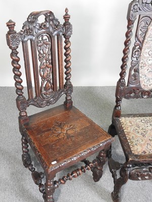 Lot 63 - A pair of 19th century carved oak high back...