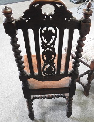 Lot 63 - A pair of 19th century carved oak high back...