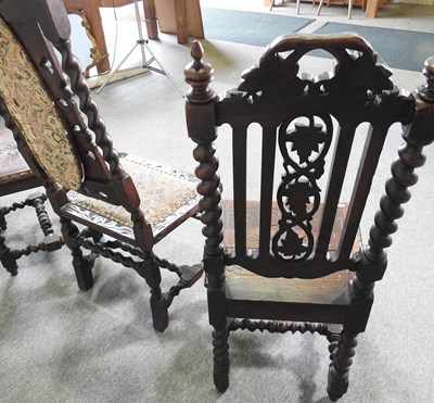 Lot 63 - A pair of 19th century carved oak high back...