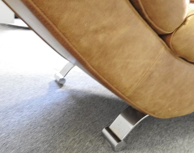 Lot 159 - A contemporary tan leather upholstered lounge...