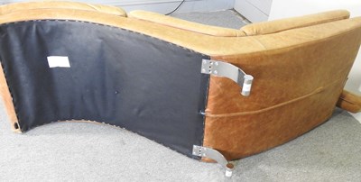 Lot 159 - A contemporary tan leather upholstered lounge...
