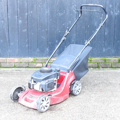 Lot 645 - A red Mountfield petrol lawnmower