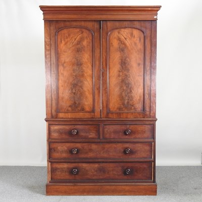 Lot 620 - A Victorian mahogany linen press, fitted with...