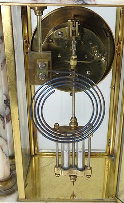 Lot 36 - A 19th century French marble three piece clock...