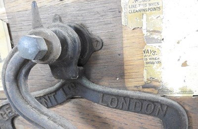 Lot 9 - A Victorian knife sharpener, labelled for...