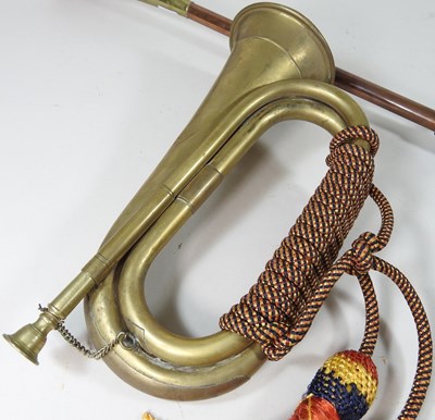 Lot 135 - A brass hunting horn, 73cm long, together with...