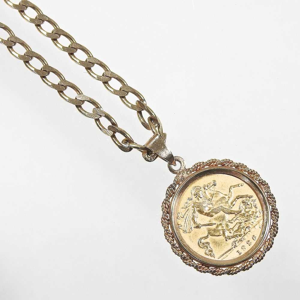 Lot 8 - A 9 carat gold pendant, with a George V half...