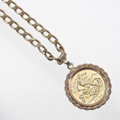 Lot 8 - A 9 carat gold pendant, with a George V half...