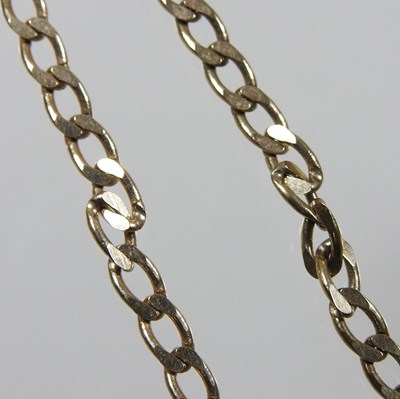 Lot 8 - A 9 carat gold pendant, with a George V half...
