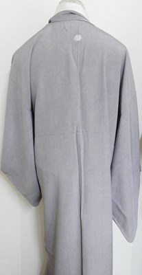 Lot 56 - A brown striped kimono, together with another (2)