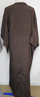 Lot 56 - A brown striped kimono, together with another (2)