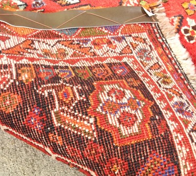 Lot 99 - A Persian qashqai runner, with floral designs,...